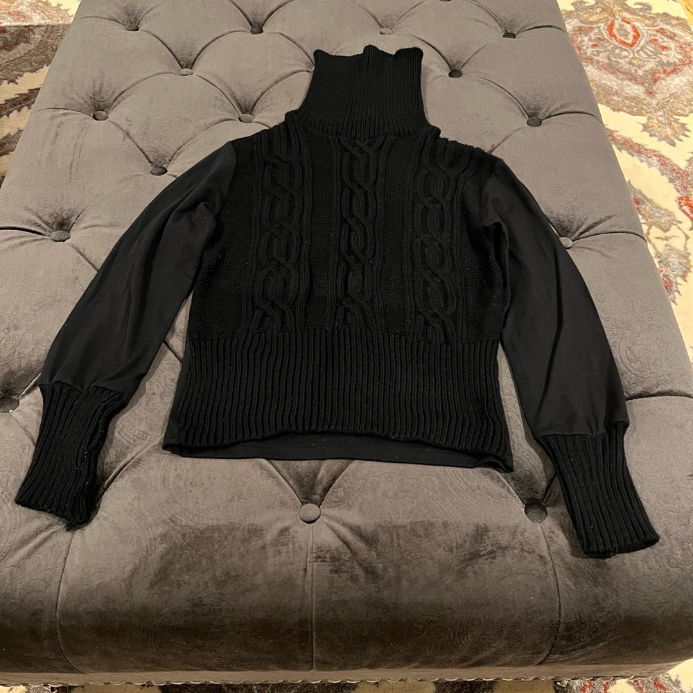 Ribbed black turtleneck sweater